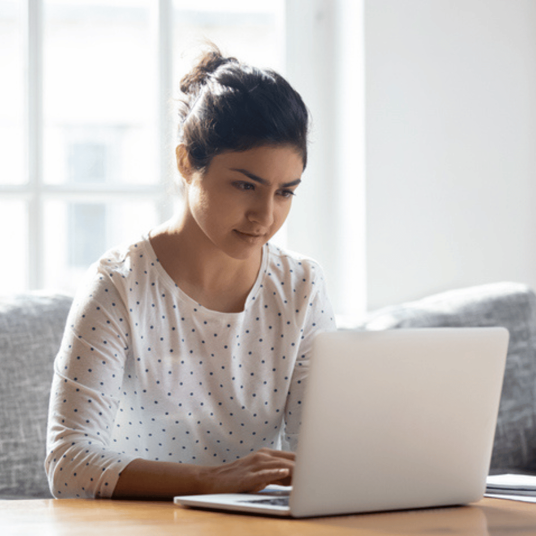 girl looking at laptop